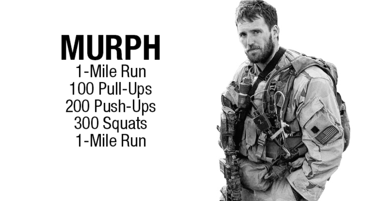 Athletes running during the Memorial Day Murph workout at a CrossFit gym